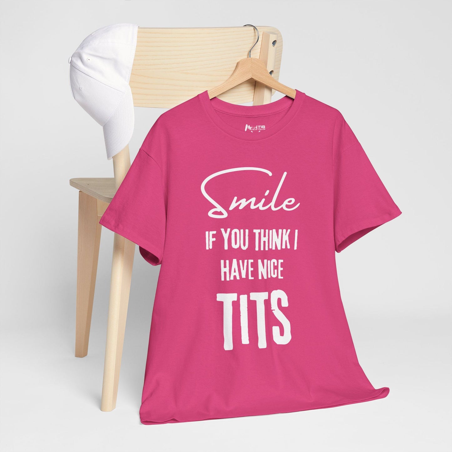 heliconia shirt celebrating cleavage pride with a teasing smirk