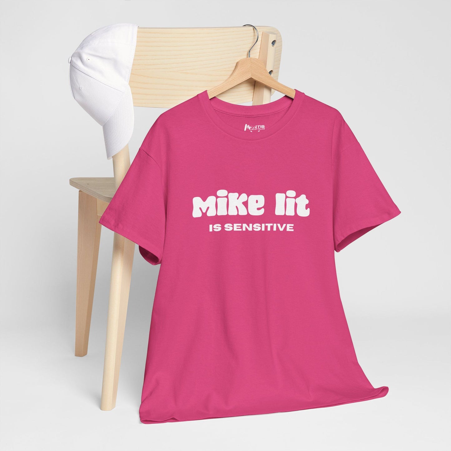 Heliconia tee pink and polished with a twisted verbal trap