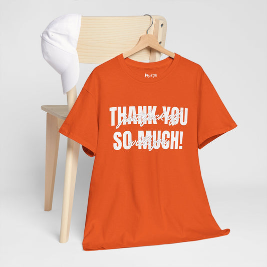 Orange tee with bold thanks and hidden hate scripted across it
