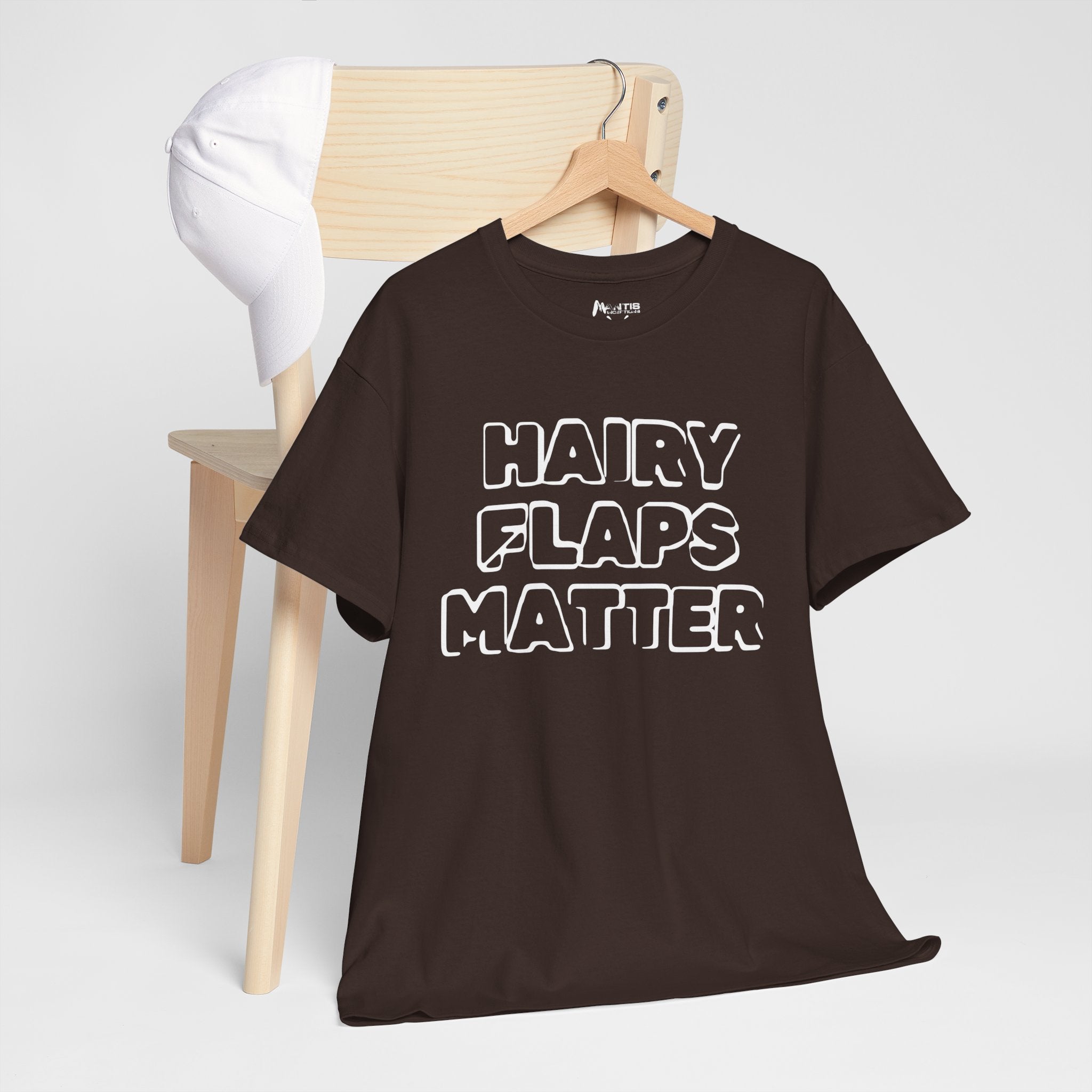 dark chocolate tee declaring support for bushy pride with bold satire